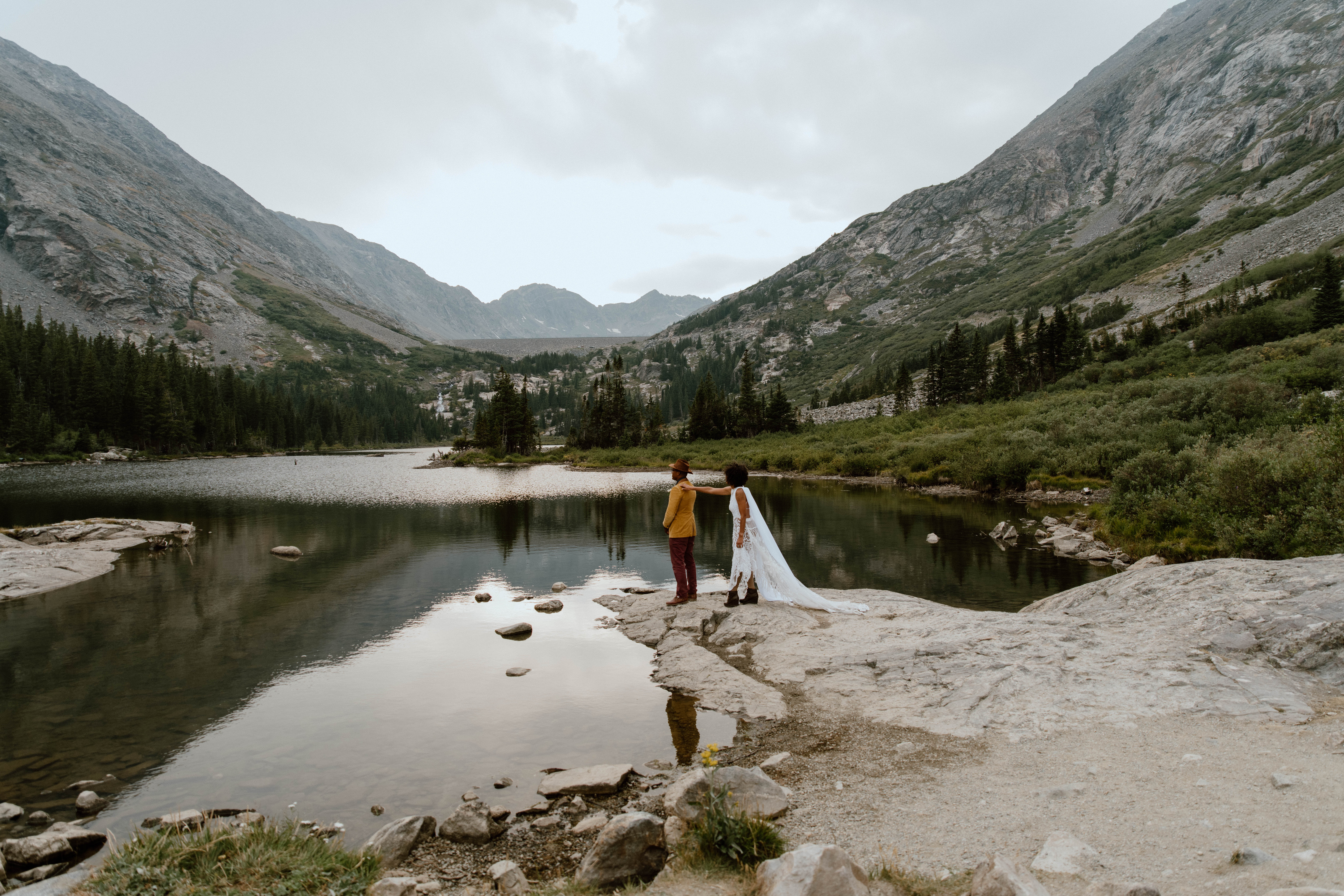 A couple is about to have their first look moment in Colorado during their hiking elopement