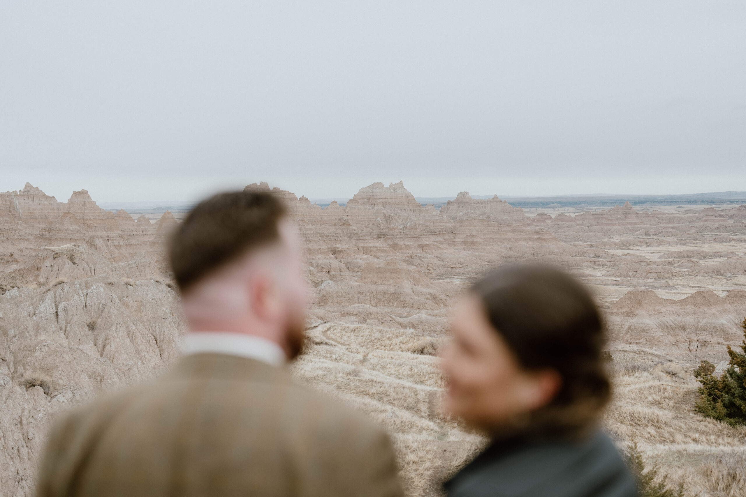 A blurry photo shows a couple in Badlands National Park