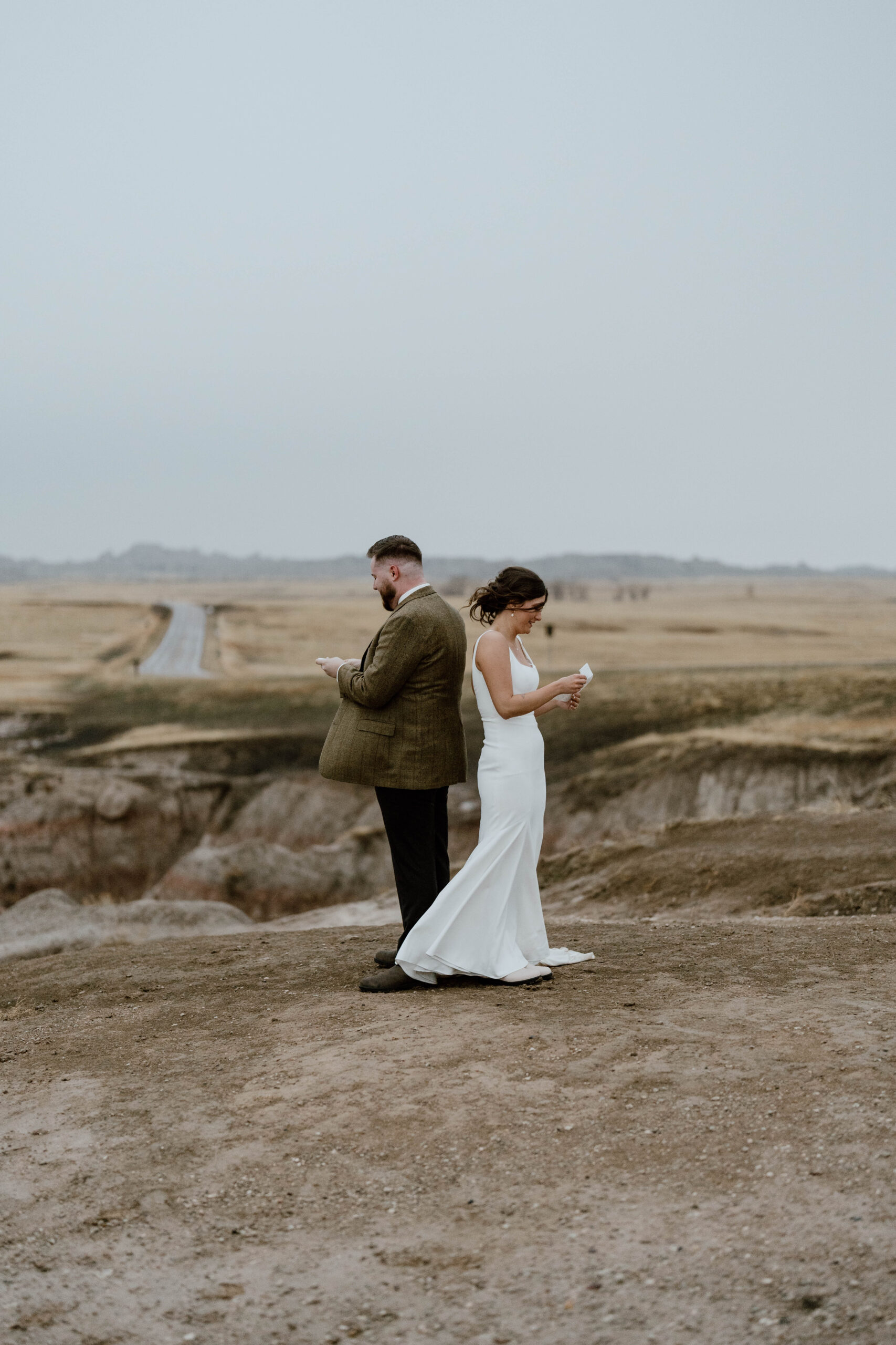 A couple is seen reading vows in a national park