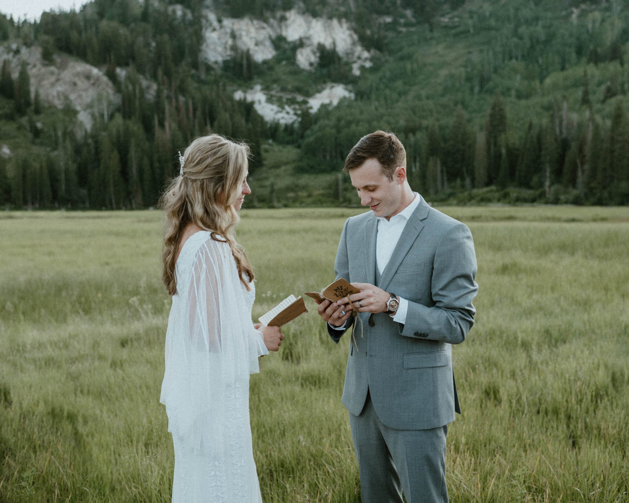 A couple is seen during their elopement ceremony in Utah saying vows